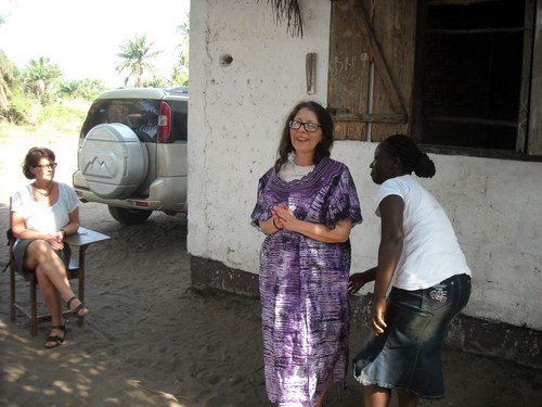 Nancy, a teacher, gowning Lena