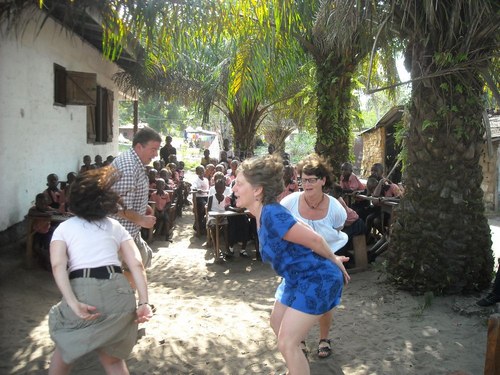 Our visitors doing a traditional Swedish play for the school