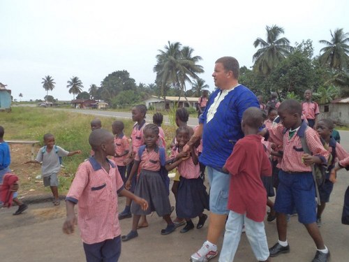 Anders and students walking to the future site