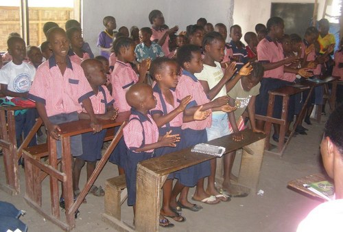 Students singing at the closing program