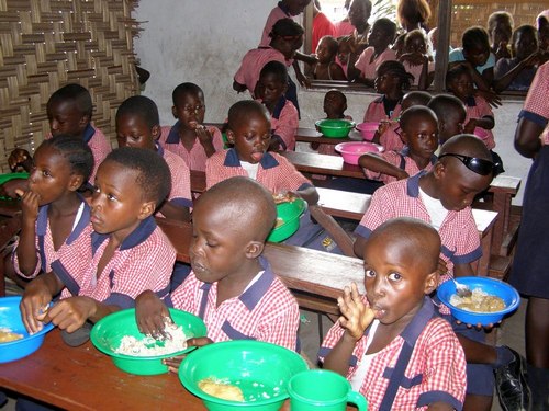 Students enjoying bean rice