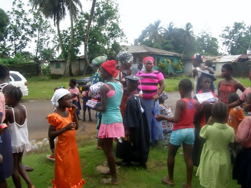Attendees standing outside after the program