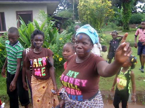 Some gleeful parents in action outside the hall