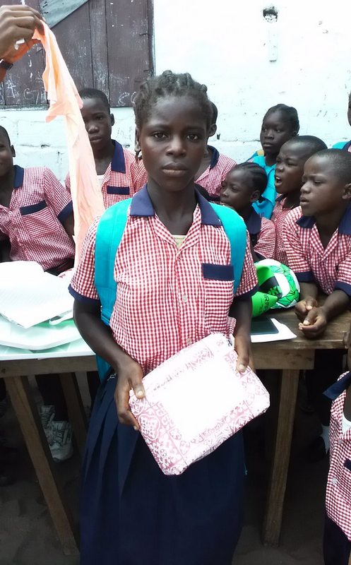 Kerstin’s sponsored child (Susan) displays her sent parcel