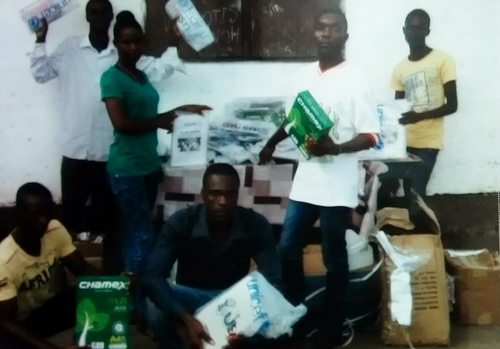 Staff displaying some of the donated items