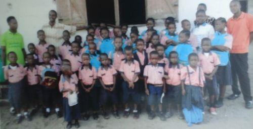 Staff posing with students