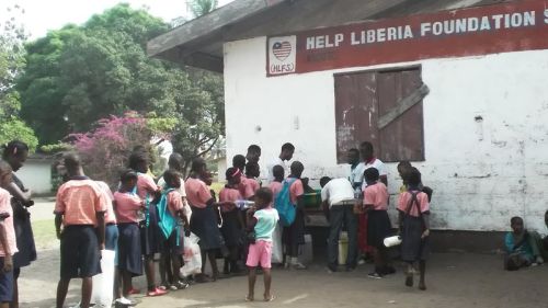 Kids in line to receive their food ration