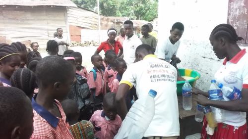 Staff members helping to organize the distribution