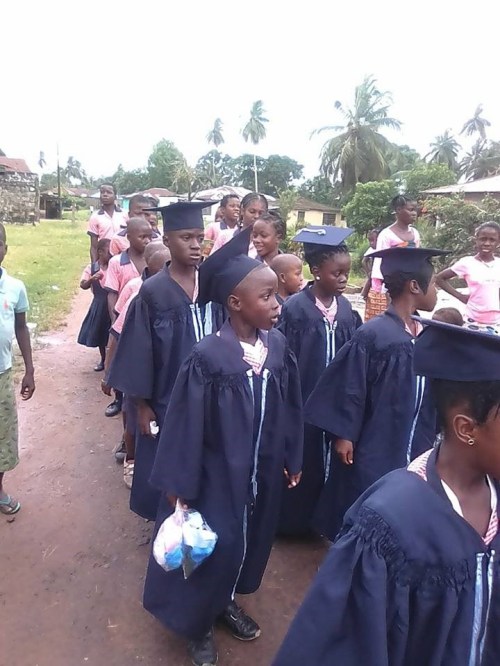 Kids marching to the hall