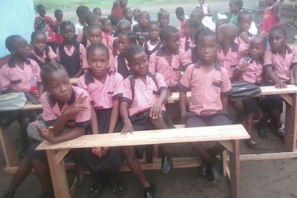 Kids sitting on the desks upon arrival