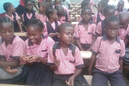 Kids sitting on the desks