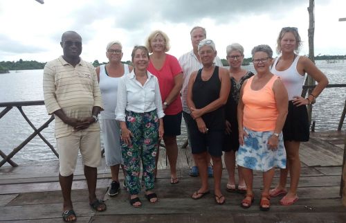 Eight of the visitors, along with Paul, at the Elizabeth Village and Resort