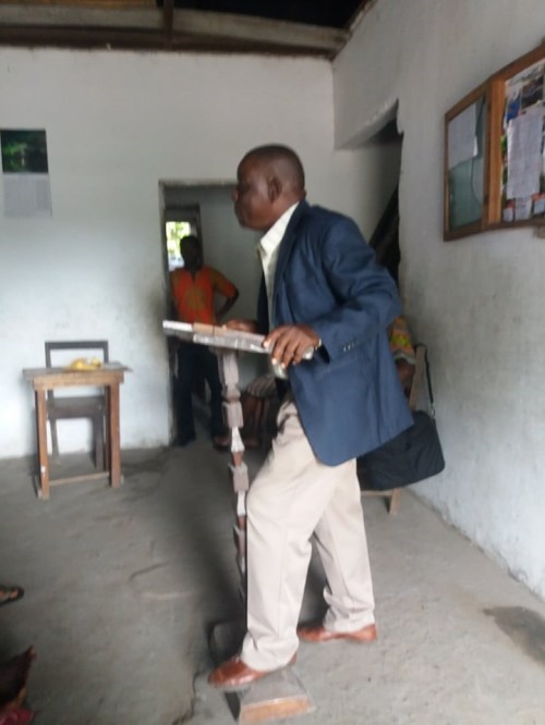 Mr. Telio speaking to the parents during the meeting